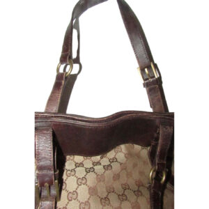 Gucci brown Guccissima print canvas & leather strappy cylindrical tote with brass accents | Luna Bags