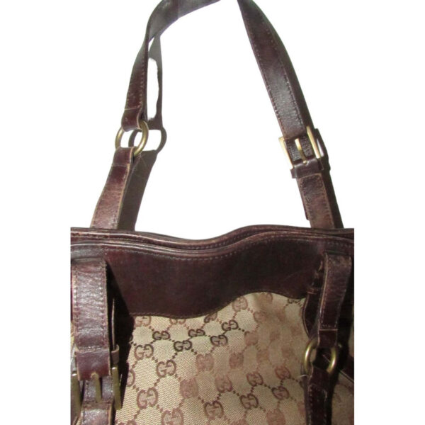 Gucci brown Guccissima print canvas & leather strappy cylindrical tote with brass accents | Luna Bags