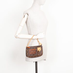 LOUIS VUITTON Pochette Accessoires Perforated Canvas MNG | Luna Bags