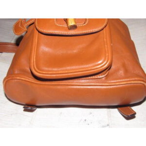 Gucci caramel brown colored leather, two strap, petite, drawstring top, multi-pocket, messenger bag/backpackk | Luna Bags