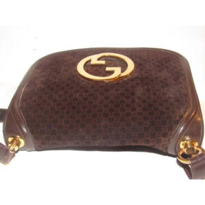 Gucci Blondie, brown square G logo print suede and brown leather, saddle bag style, shoulder bag with large, gold 'GG' cut-out | Luna Bags