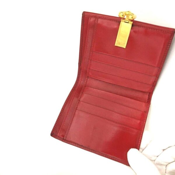 Gucci, red leather, bi-fold style, wallet with multiple pockets, tons of card slots, & a gold, engraved 'GUCCI' horseshoe accent | Luna Bags